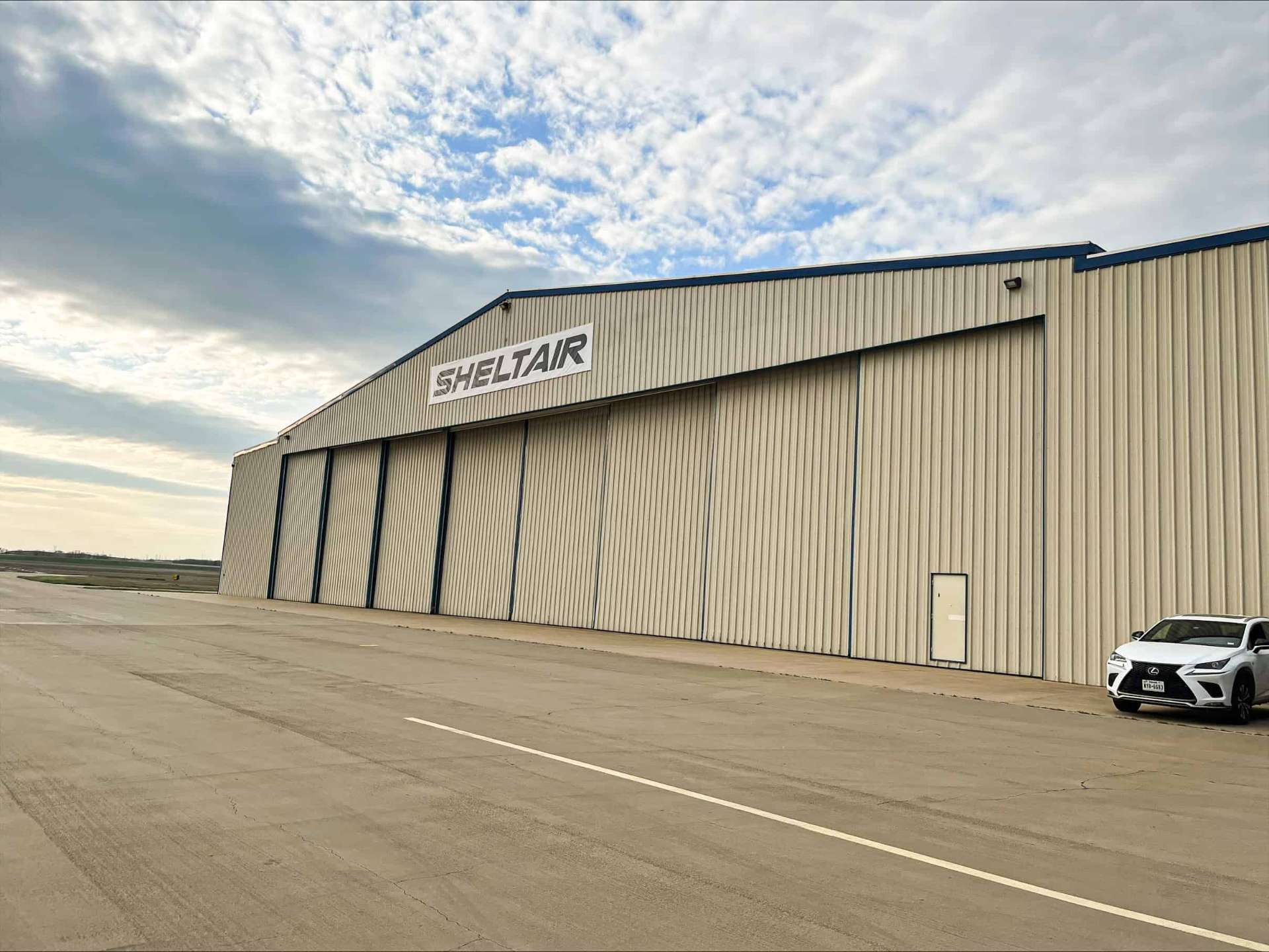 Sheltair hangar exterior at DTO